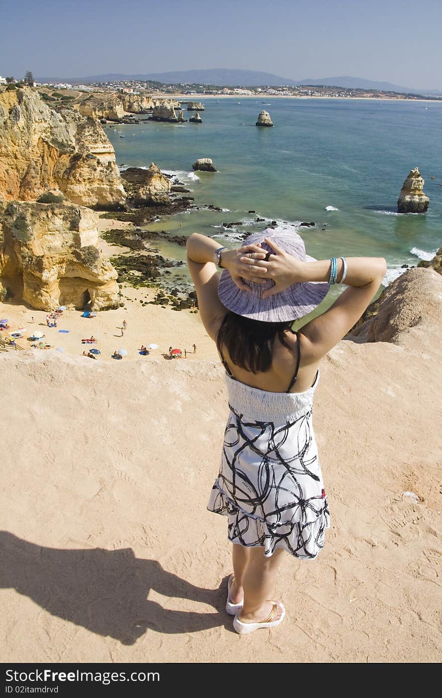 Woman watches the sea