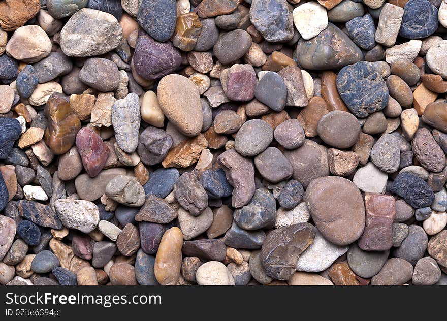 Abstract background from multi-coloured stones
