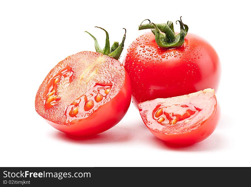 Close-up of fresh tomato on white background. Close-up of fresh tomato on white background