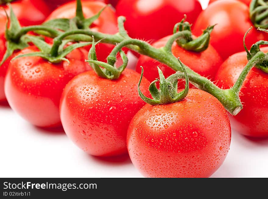 Close-up of fresh tomato on white background. Close-up of fresh tomato on white background