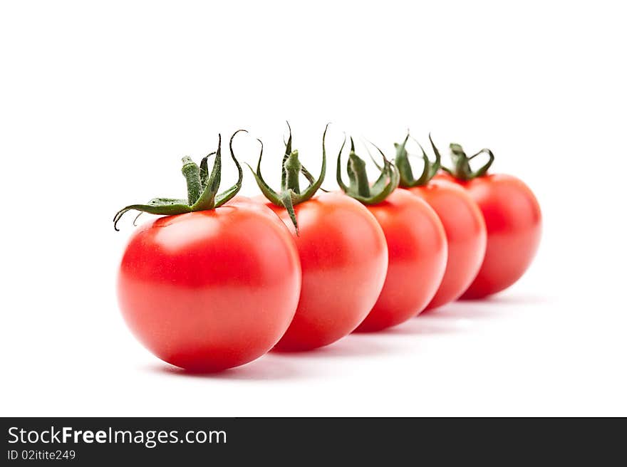 Close-up of fresh tomato on white background. Close-up of fresh tomato on white background