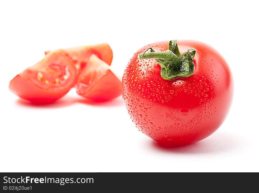 Close-up of fresh tomato on white background. Close-up of fresh tomato on white background