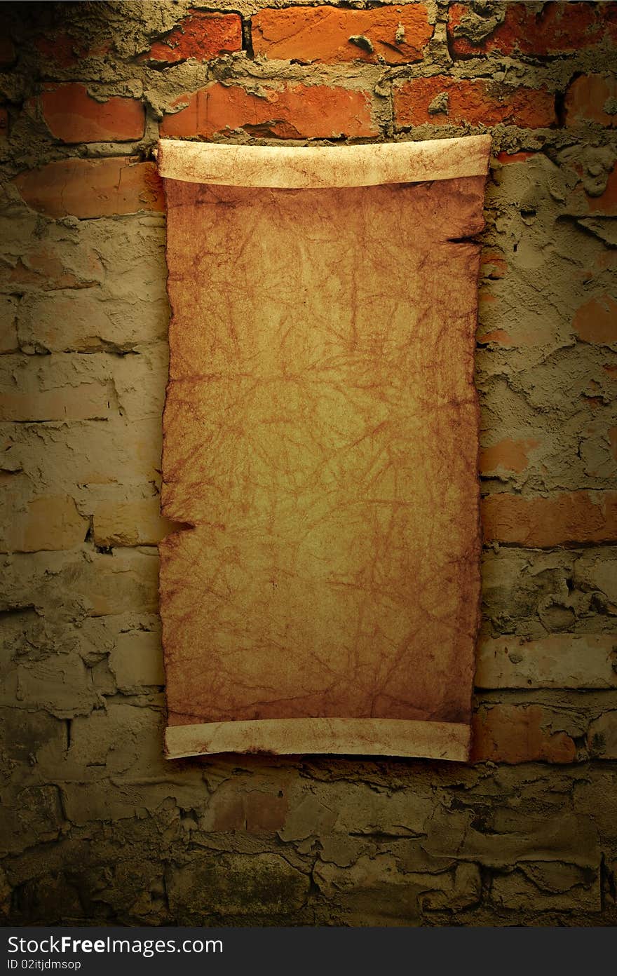 Scroll of old parchment, hanging on the wall grunge