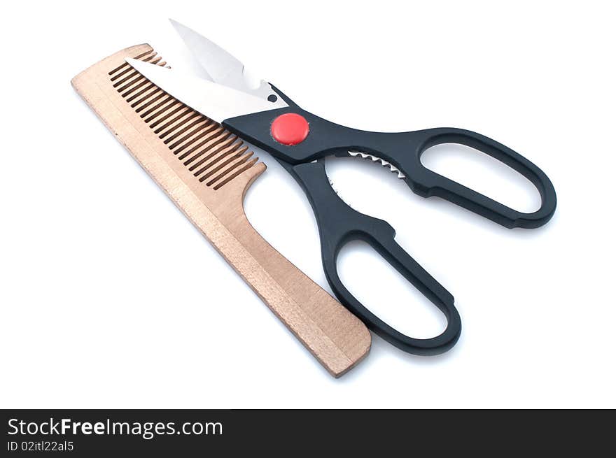 Scissors and combs isolated on a white background