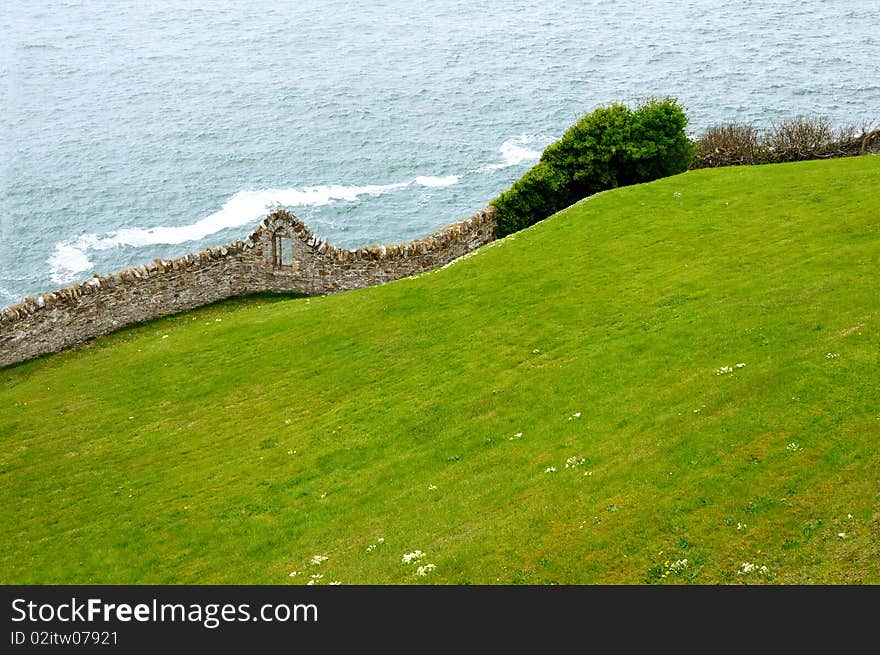 Stone fencing by the ocean in Ireland