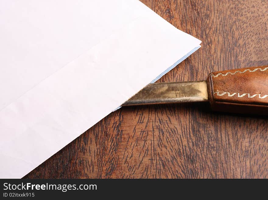 Postal letter dismolition on the desk. Postal letter dismolition on the desk.