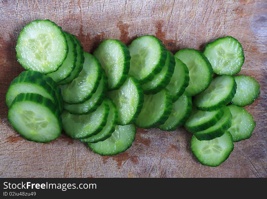 Fresh sliced cucumber green board. Fresh sliced cucumber green board