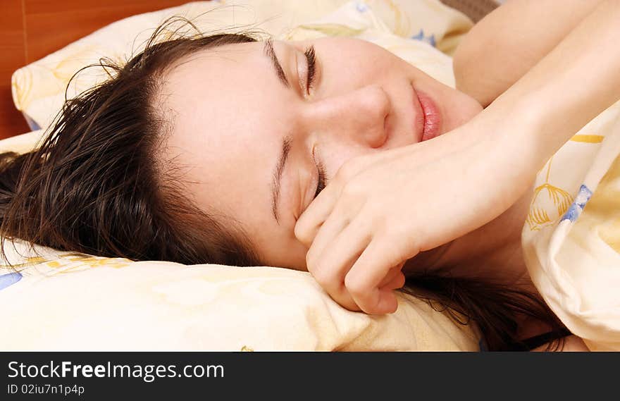 Young woman awaking