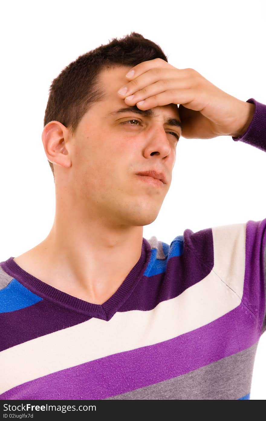 Young man with headache, isolated in white background