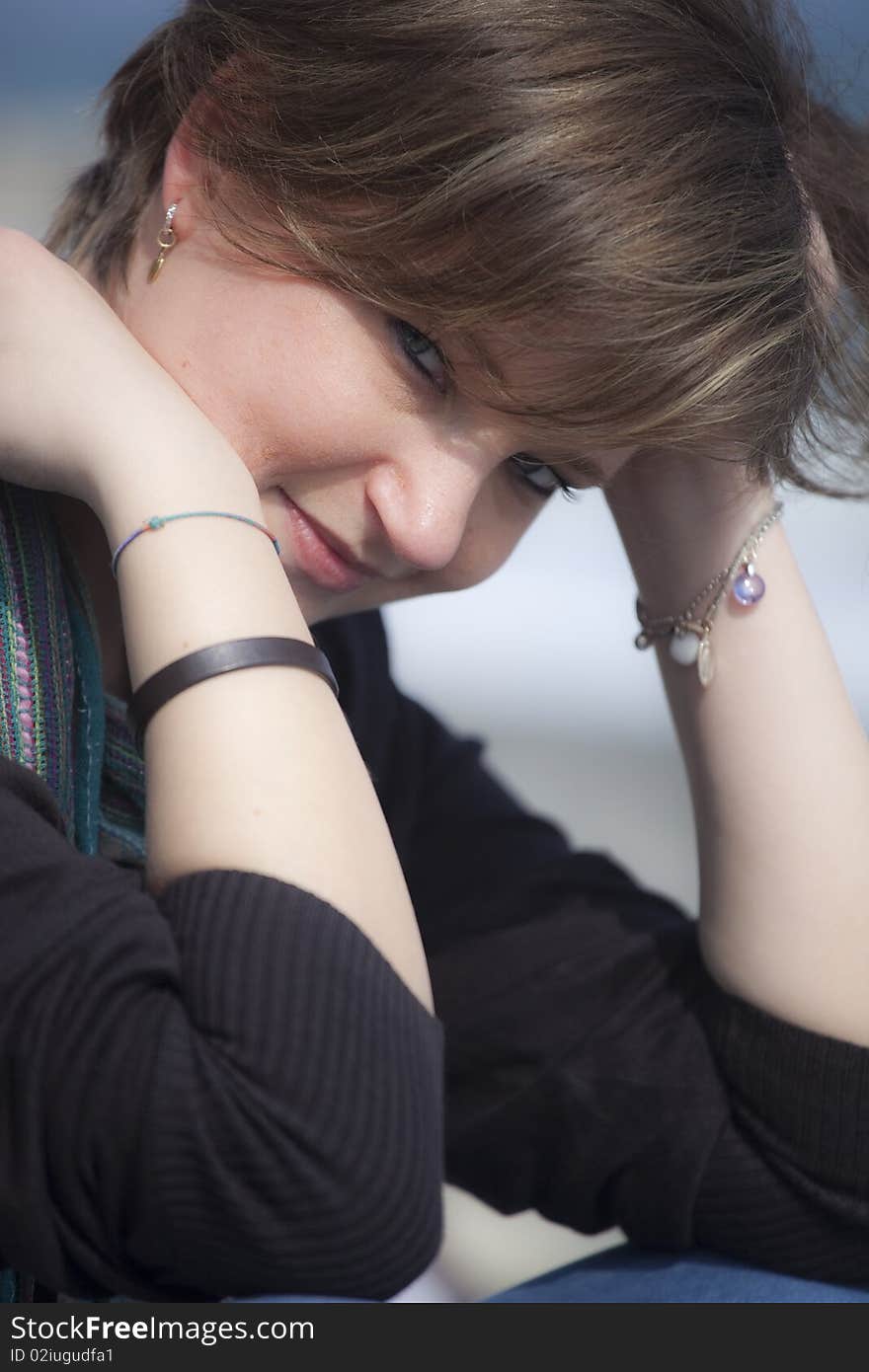 Thoughtful girl isolated from the background with sad and suspicious attitude. Thoughtful girl isolated from the background with sad and suspicious attitude