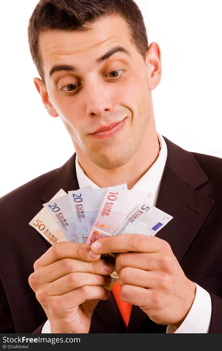 Happy young business man with money, over white background. Happy young business man with money, over white background