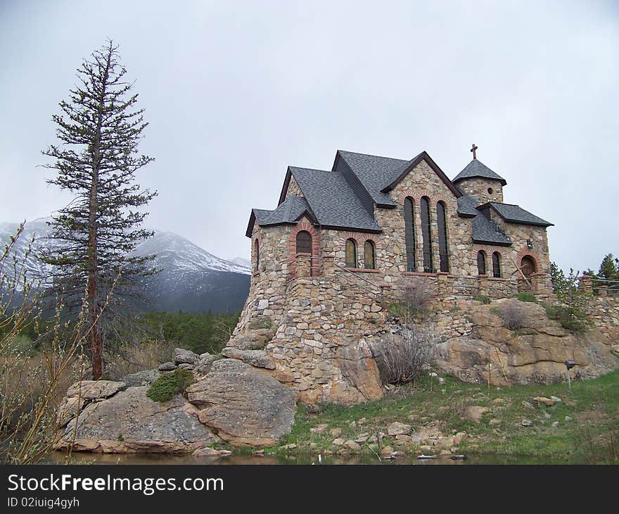 This historic chapel was built high on the rocks surrounded by a reflecting pool and used for religious retreats and by visitors to Colorado.