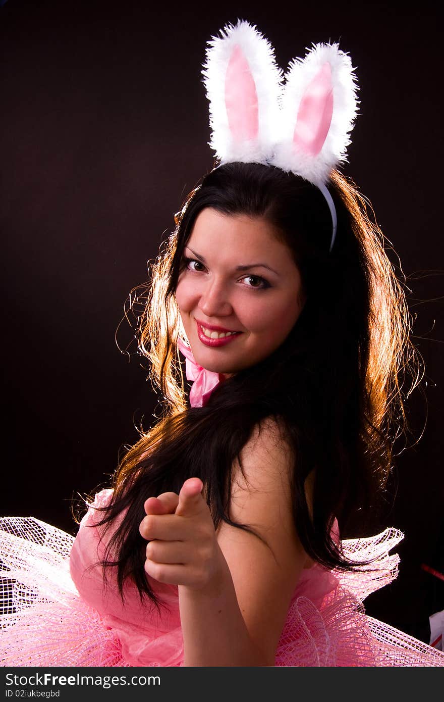 Woman wearing fancy dress on Halloween. A young female dressed up as rabbit Cute girl in playboy costume on white backgrounds. Woman wearing fancy dress on Halloween. A young female dressed up as rabbit Cute girl in playboy costume on white backgrounds.