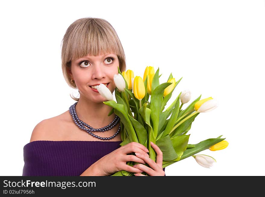 Woman with flowers.  Picture of happy blond with and yellow tulips.  Spring beauty. Pretty young female holding bouquet of tulips isolated on white background . Woman with flowers.  Picture of happy blond with and yellow tulips.  Spring beauty. Pretty young female holding bouquet of tulips isolated on white background .