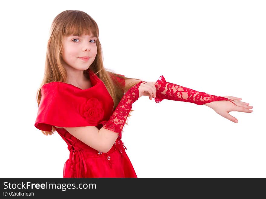 Little girl is wearing red dress and gloves. Close-up portrait of a beautiful blond girl.