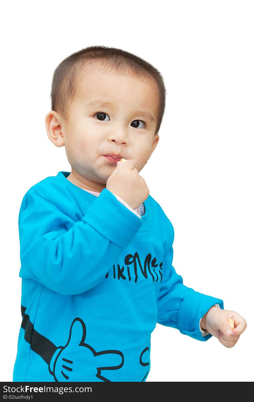 Baby boy enjoying biscuit