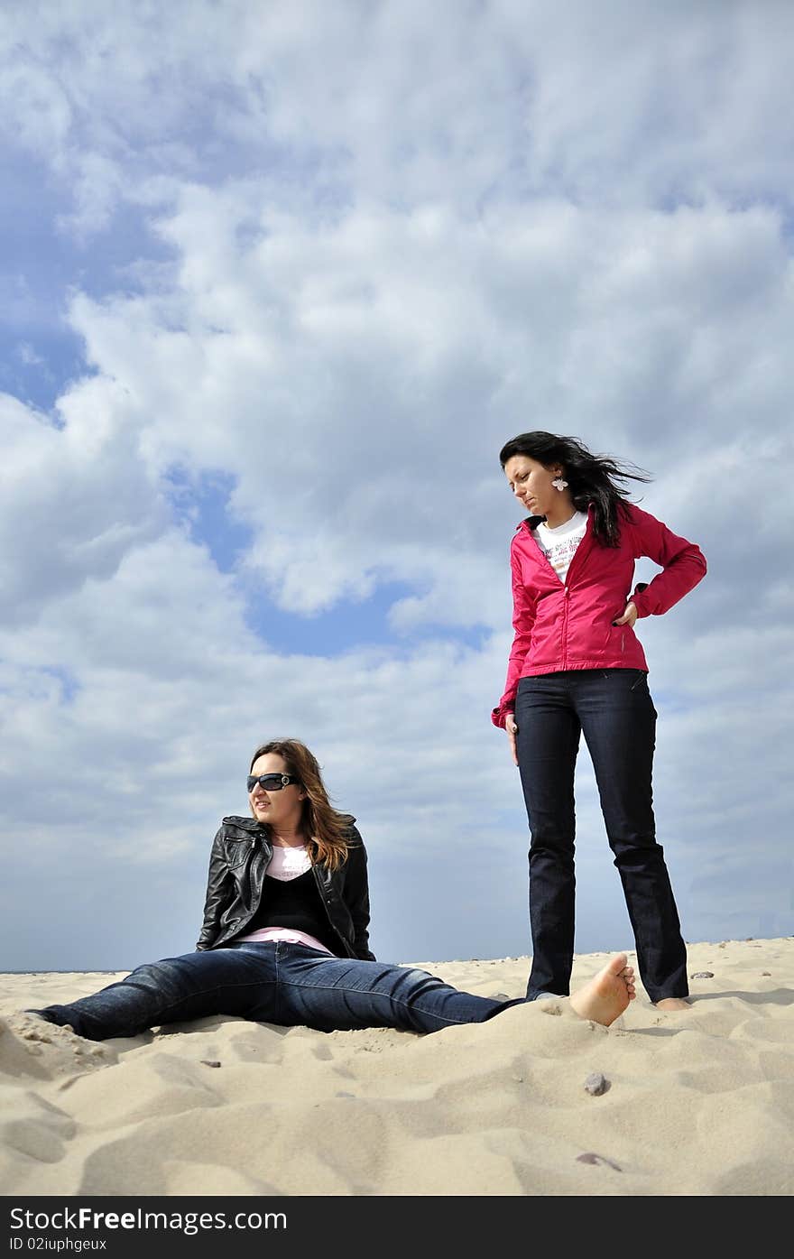 An image showing young girls on the beach. An image showing young girls on the beach