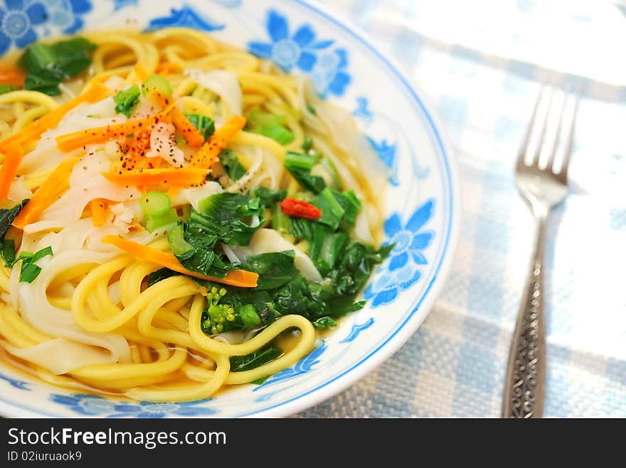 Colorful Asian style soup noodles