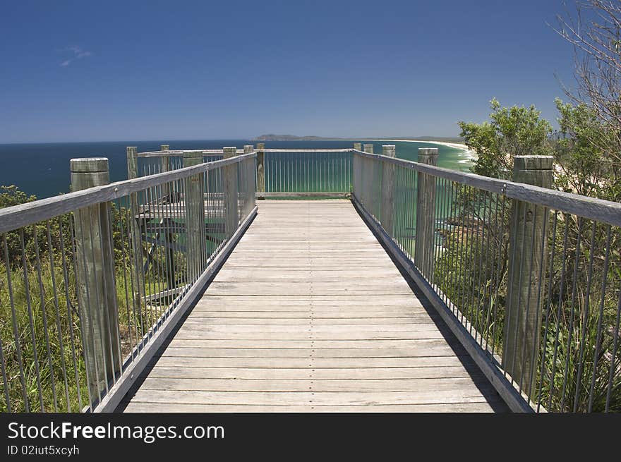 A wooden observation platform overlooking an Australian east coast beach. A wooden observation platform overlooking an Australian east coast beach.