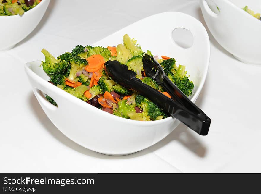 Fresh salad with beans, carrots and broccolis