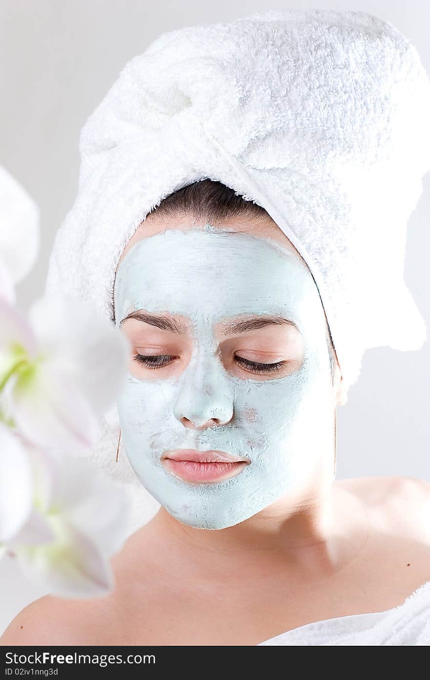 Young female with skincare mask on. Young female with skincare mask on