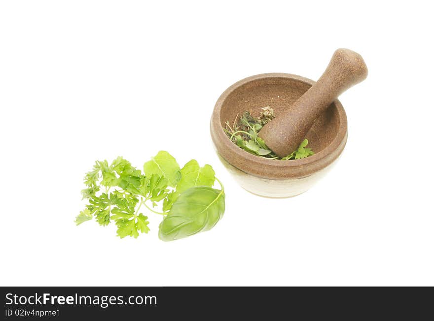 Fresh herbs and pestle and mortar