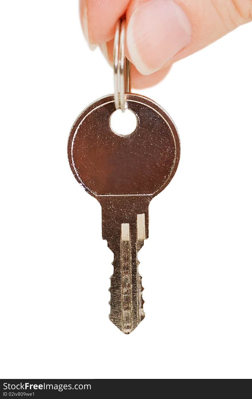 Key in a hand isolated on white background