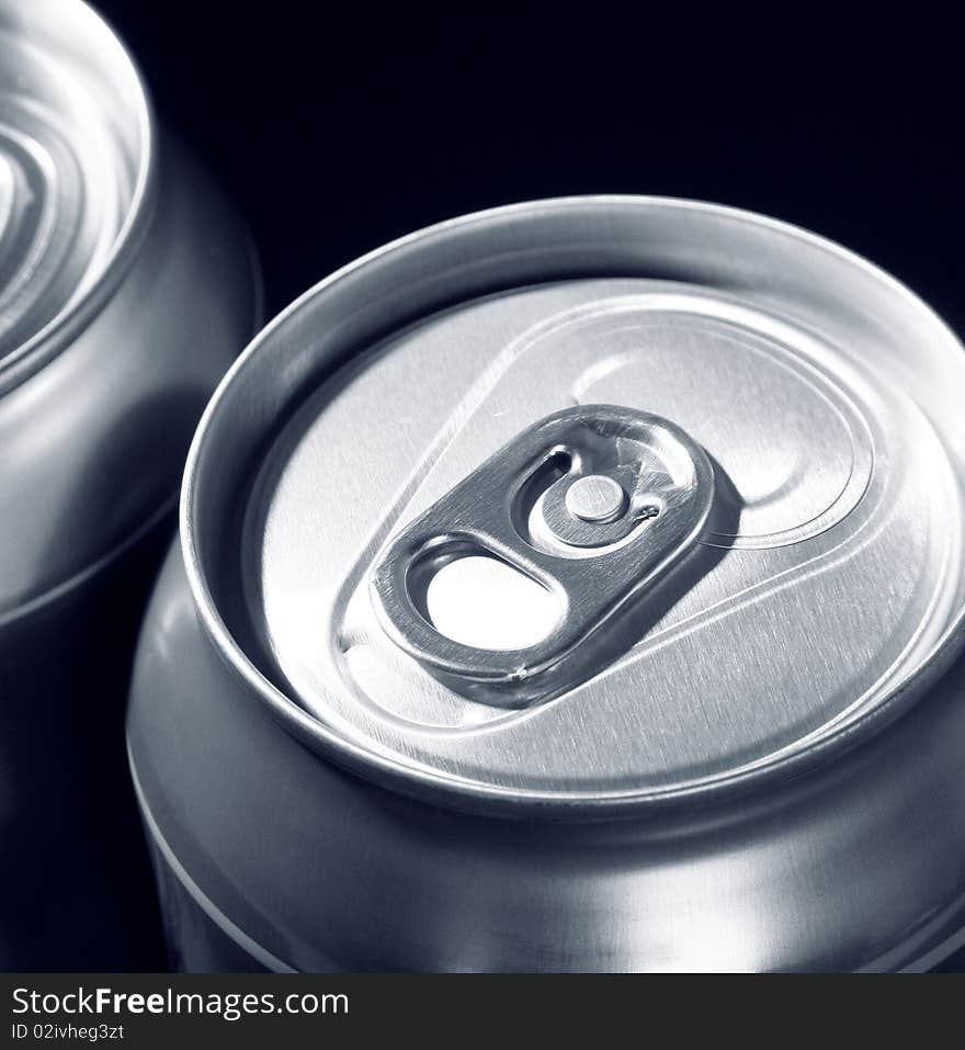 Beer cans on a dark background