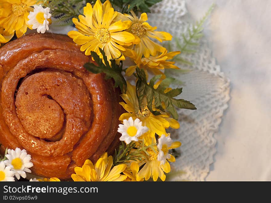 View of a traditional folar cake on the a portuguese table.