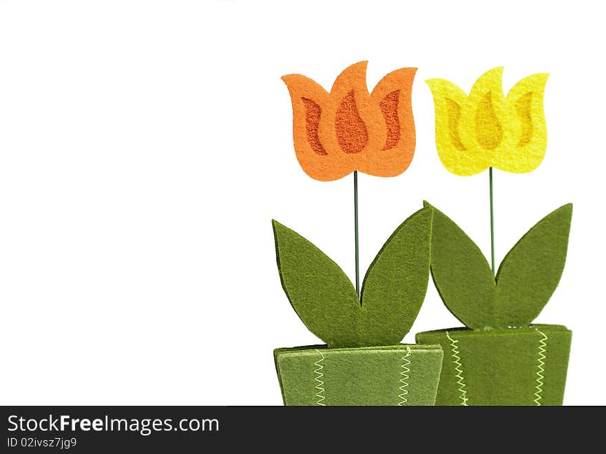 Flower decoration from felt isolated on white background.