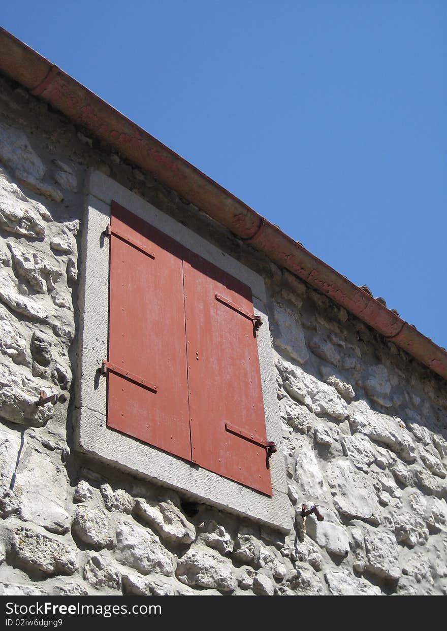 Sun shutters at mediteranian sea on a old house. Sun shutters at mediteranian sea on a old house