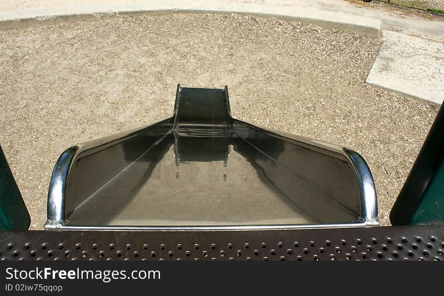 Looking down a slide on a playground. Looking down a slide on a playground