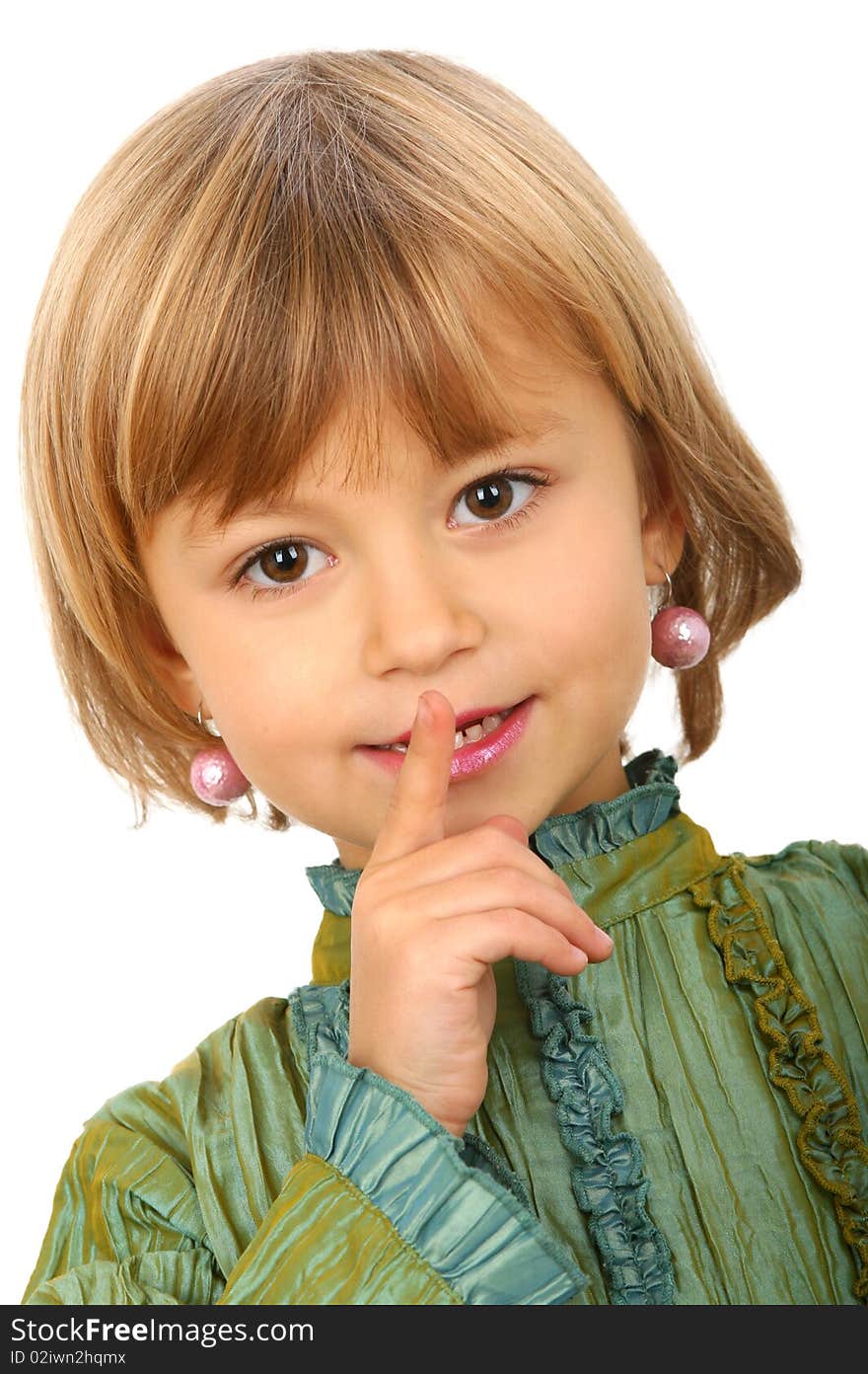 Little charming girl against white background