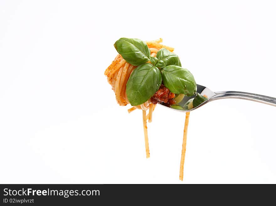 Spaghetti bolognese and basil