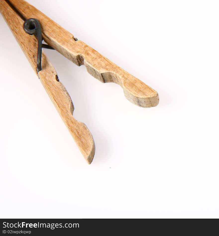 Wooden clothespin on white background