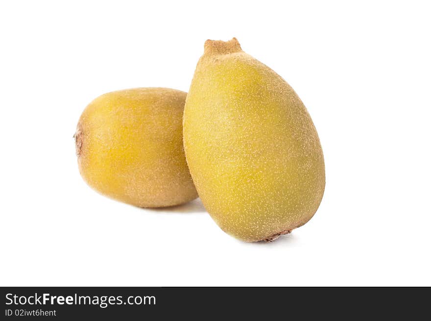 Two golden kiwi fruit on white background