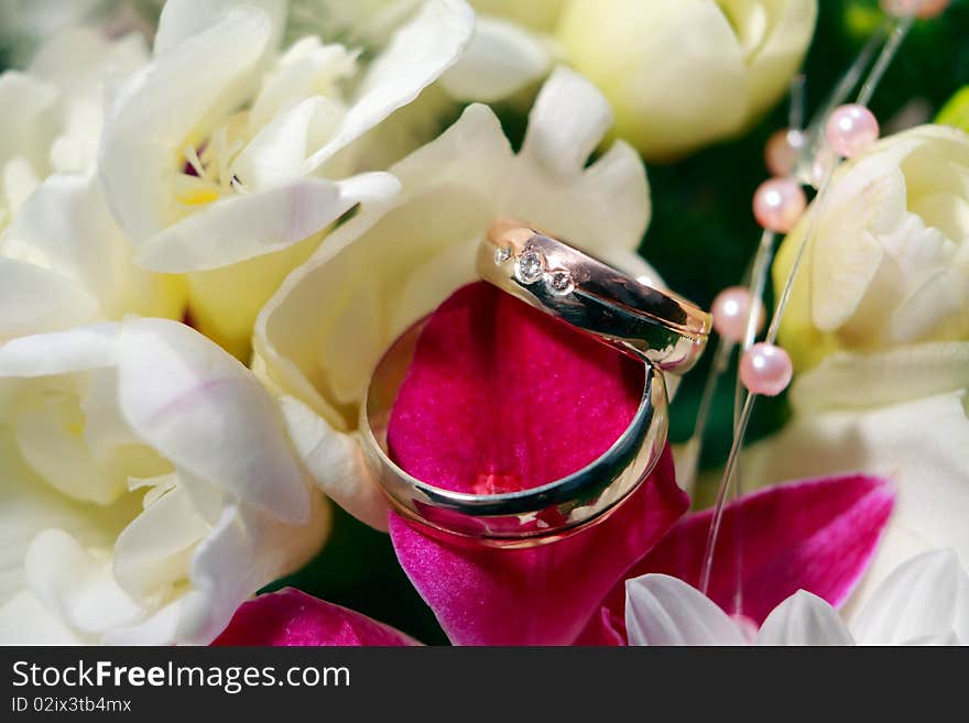 Wedding Rings detail with flowers. Wedding Rings detail with flowers