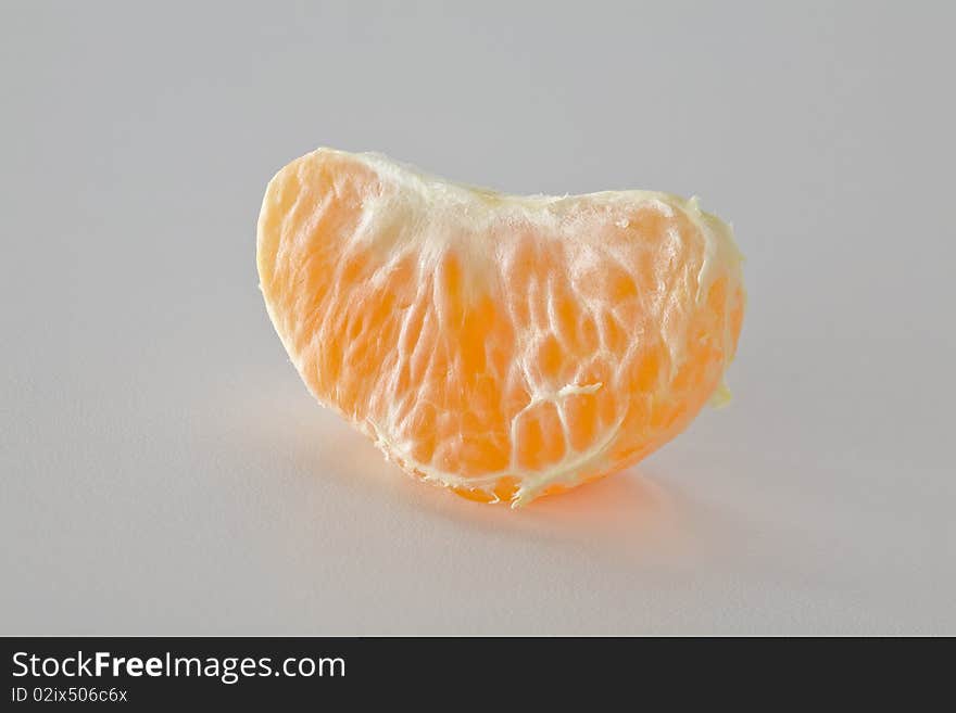 Close up mandarin orange segment isolated