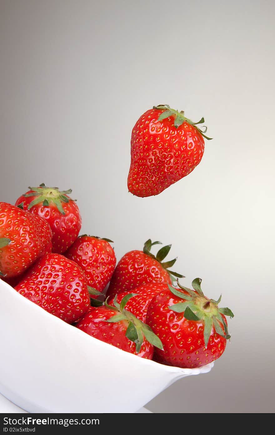 Strawberry on a white plate. Strawberry on a white plate