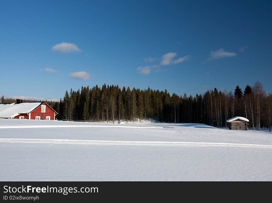 Small wooden house in winter. Finland.