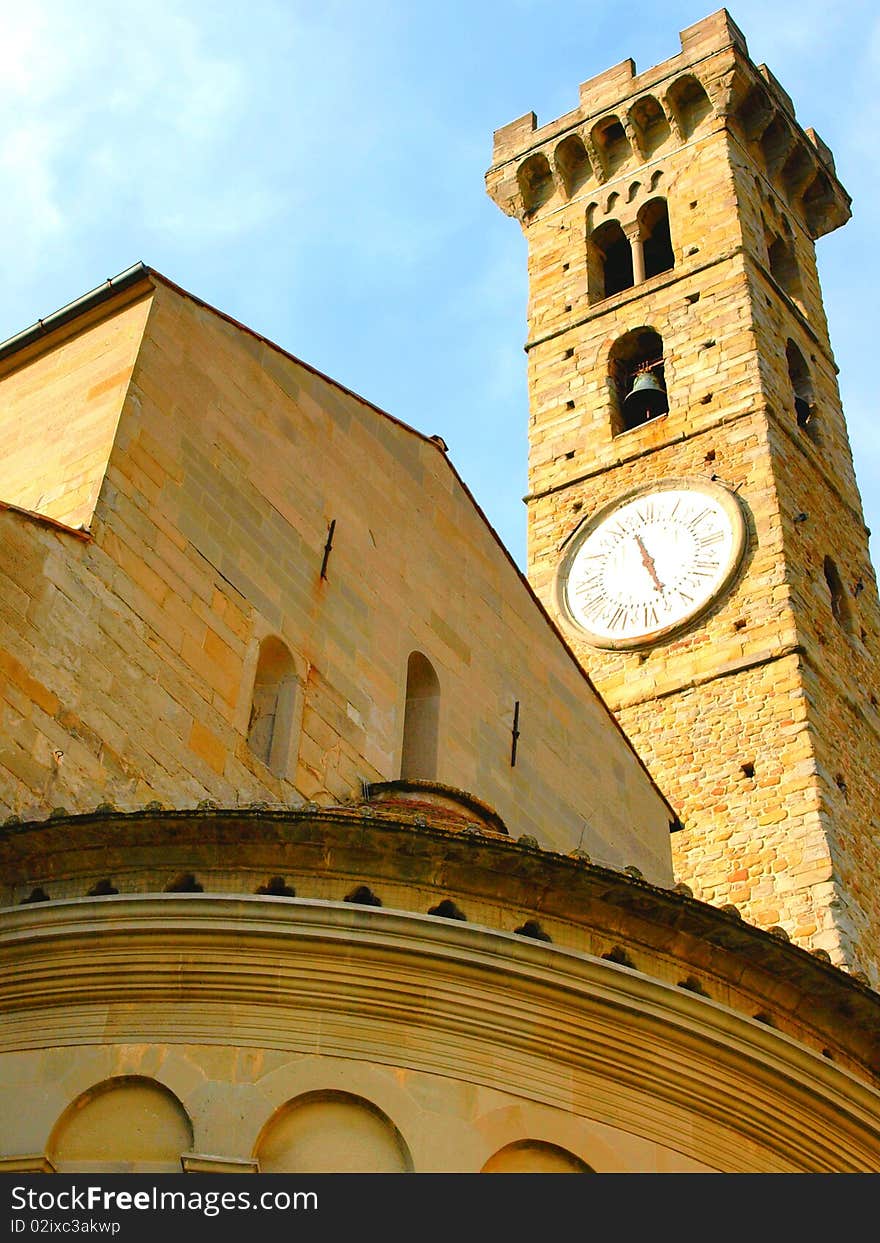 A belltower clock in Fiesole square - Tuscany,Italy