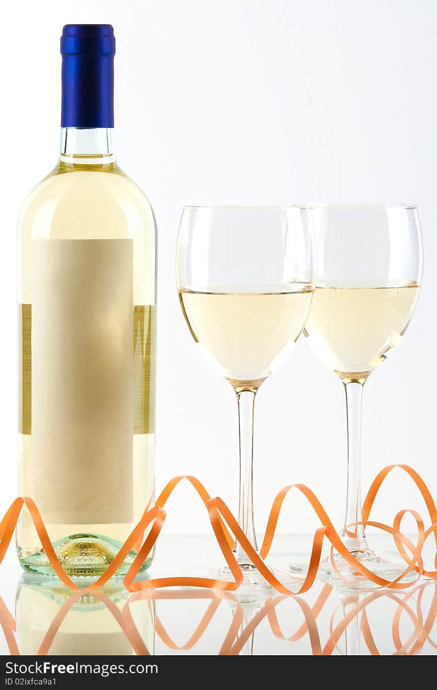 Bottle of white wine and wine glasses