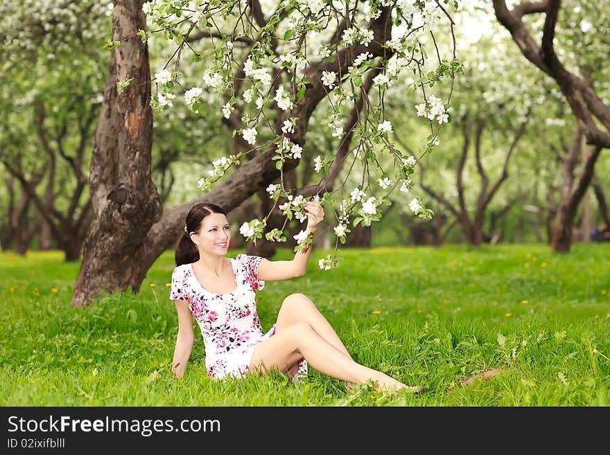 Woman with flowering tree