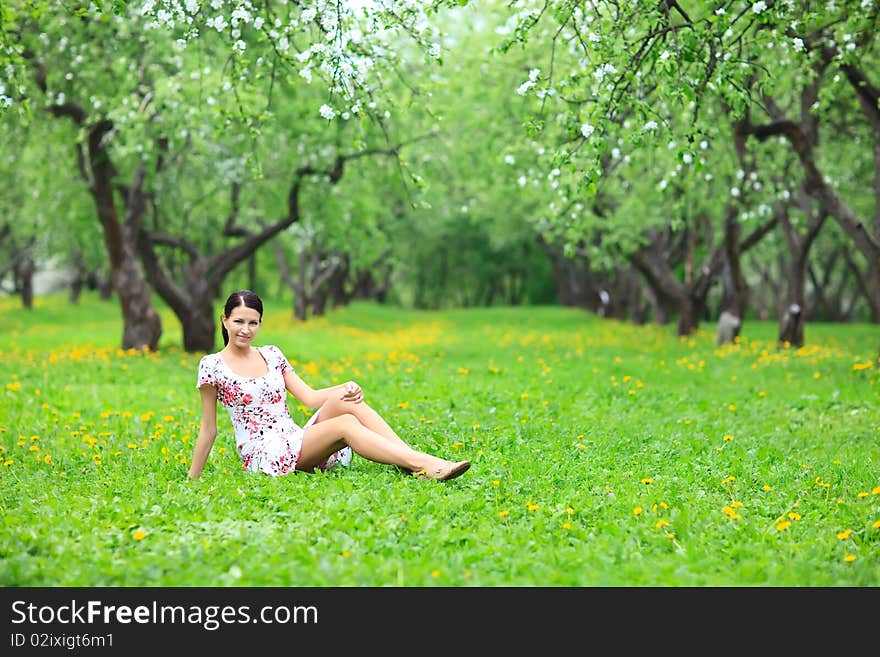 Woman relaxing in forest.