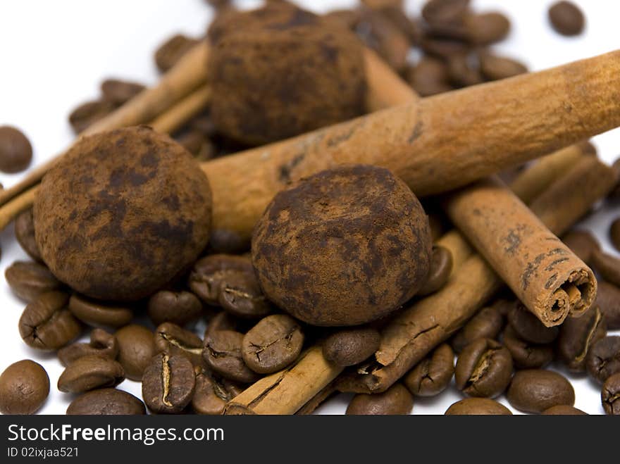 Coffee beans, truffles and cinnamon sticks