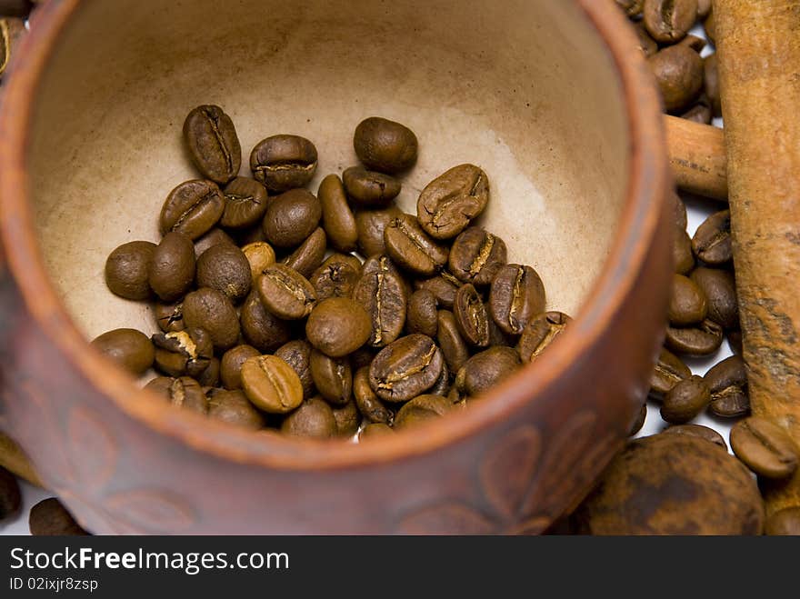 Coffee beans in cup close-up