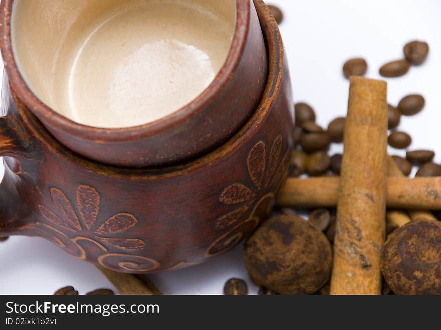 Coffee cups and coffee beans close-up