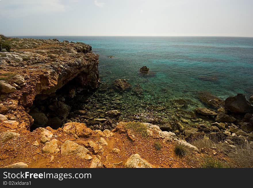 Rugged coastline taken on the Balearic island of Menorca. 
Shot at wide angle and with a polariser filter. Rugged coastline taken on the Balearic island of Menorca. 
Shot at wide angle and with a polariser filter.