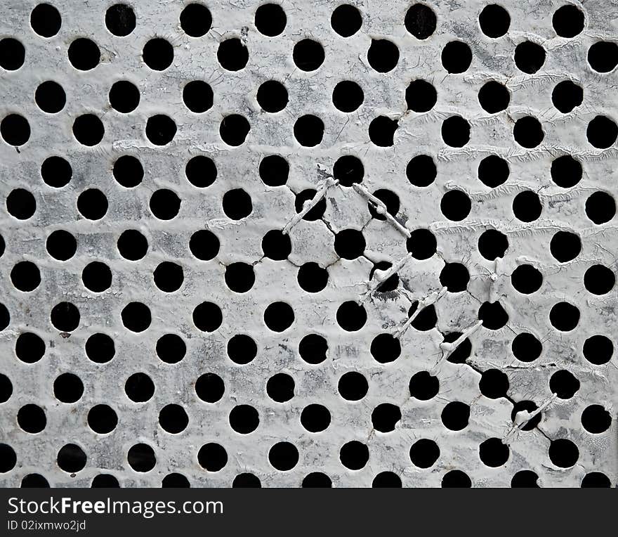 Abstract grey background in the form of a grid in a grunge style