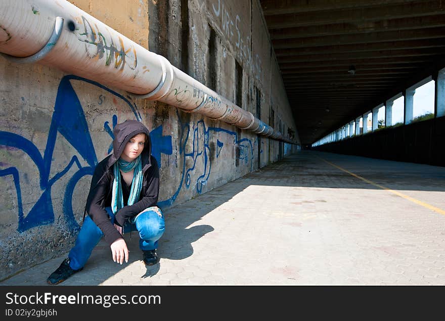 Russian girl in suburban contest wearing black hood. Russian girl in suburban contest wearing black hood